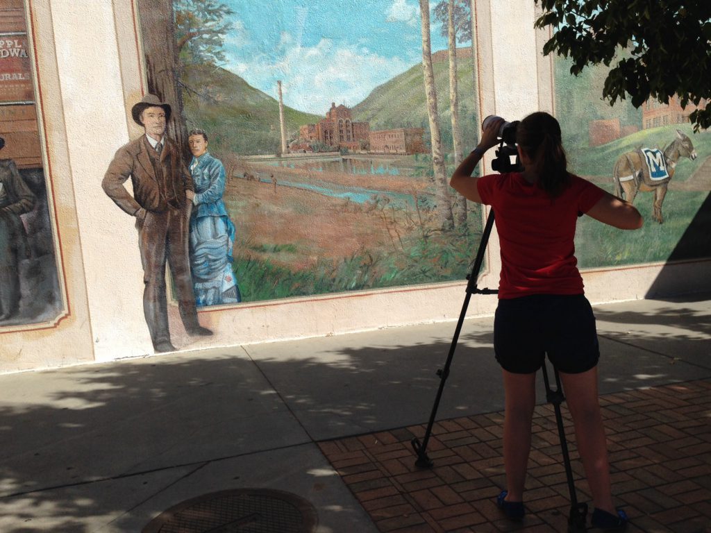 Filming the Robert Dafford mural on the Foss Building in downtown Golden