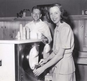 Bill and Dorothy Harmsen serving ice cream at their very first store in Golden, Colorado.