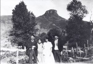 several people posing in front of South Table Mountain