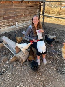 Kasey Snow with chickens