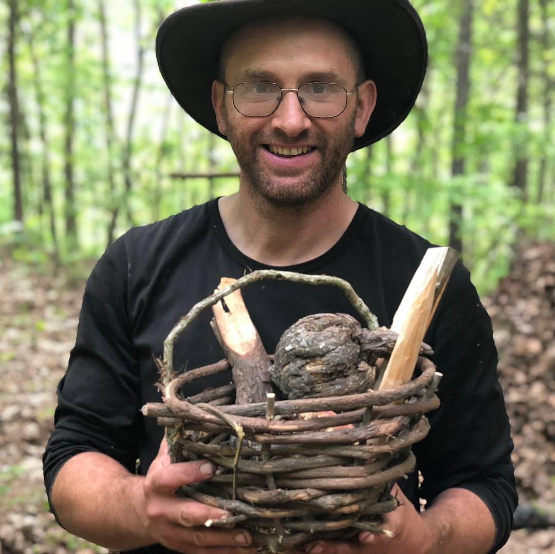 man holding basket