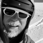 photo of man in the snow