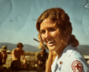woman in red cross uniform
